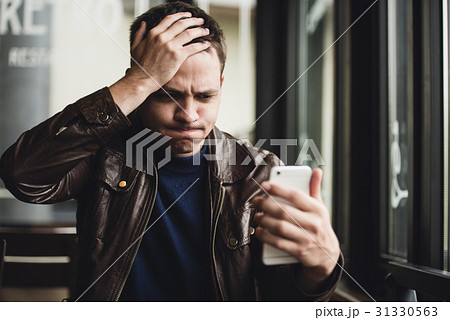 Closeup portrait, stressed young man in purple 31330563
