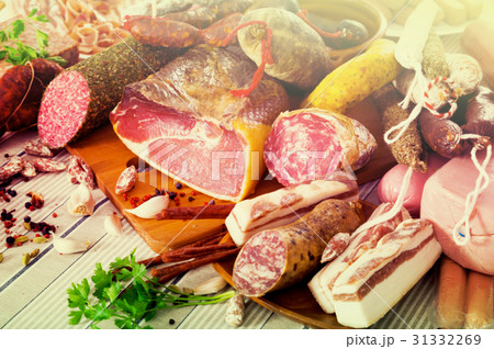 Variety of meats on table Variety of meats on table 31332269