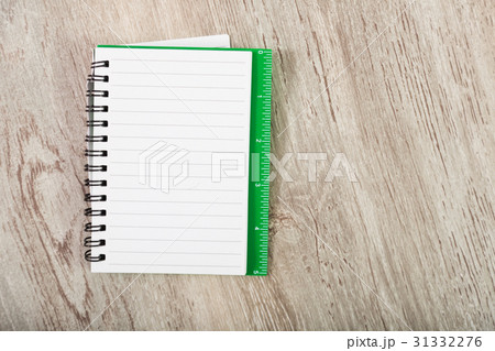 Notebook in line on table 31332276
