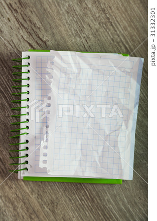 crumpled page on notebook 31332301