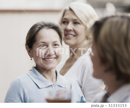 mature woman on a balcony 31333153