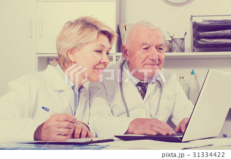 Doctor and nurse in office 31334422