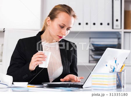 Young female drinking water Young female drinking water 31335180