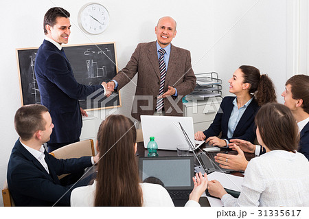 Business handshake at office meeting. Business handshake at office meeting. 31335617