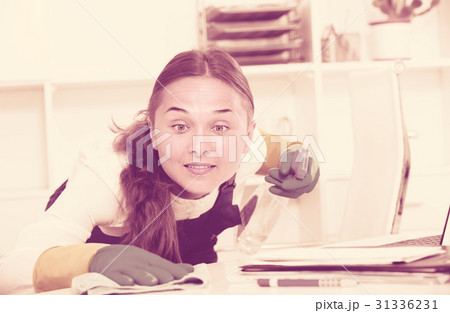female cleaner with duster 31336231