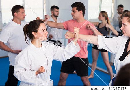 Adults training at karate class 31337453