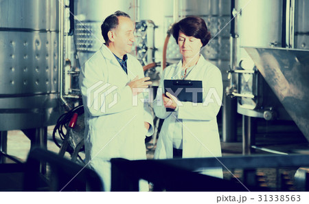 Man and woman check of equipment Man and woman check of equipment 31338563