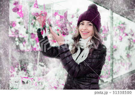 Girl shopping at festive fair before Xmas Girl shopping at festive fair before Xmas 31338580