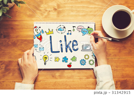 Like text with a person holding a pen Like text with a person holding a pen 31342915