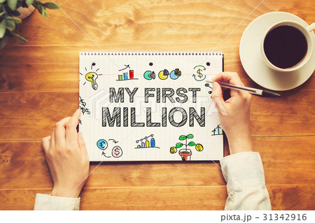 My First Million text with a person holding a pen My First Million text with a person holding a pen 31342916