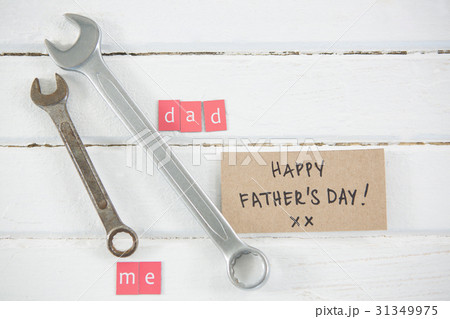 Overhead view of wrenches by father day greetings 31349975