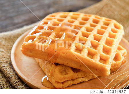 waffles honey syrup on wooden background waffles honey syrup on wooden background 31354927