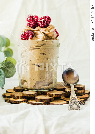 Healthy chocolate banana ice cream, raspberries 31357067