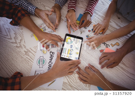 Cropped image of business team working together  31357920