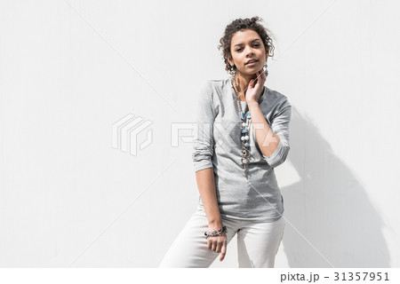 Pleasant trendy teenage female is posing Pleasant trendy teenage female is posing 31357951