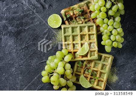 Green waffles with grapes Green waffles with grapes 31358549