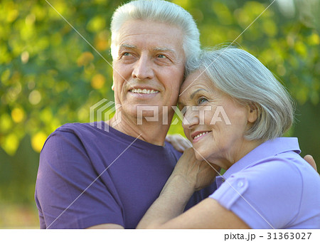 senior couple hugging senior couple hugging 31363027