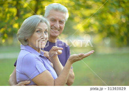 senior couple resting outdoors senior couple resting outdoors 31363029