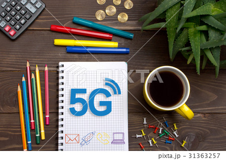 Businessman left a notes 5G with pencil in Notepad Businessman left a notes 5G with pencil in Notepad 31363257
