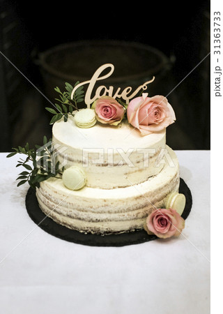 Beautiful wedding cake with cream With text Love 31363733