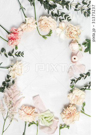 The florist work table with tools on gray wooden The florist work table with tools on gray wooden 31373237