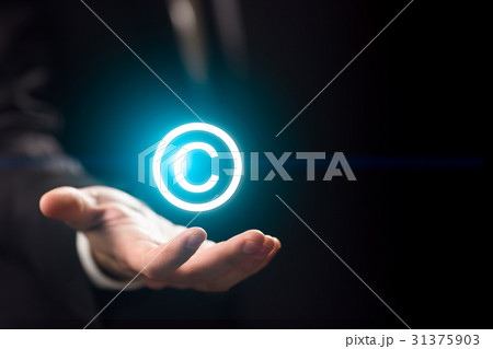 Man holds patent mark ,copyright 31375903