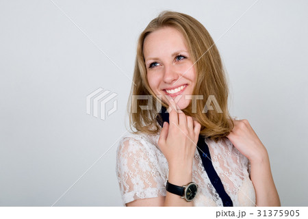 Close up portrait of cute girl with wondering face 31375905