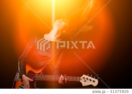 Woman in light of soffits 31375920