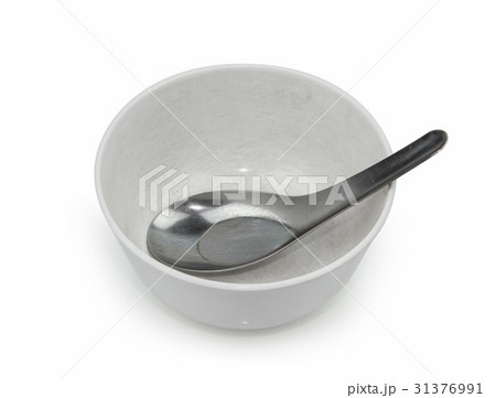 old empty bowl with spoon old empty bowl with spoon 31376991