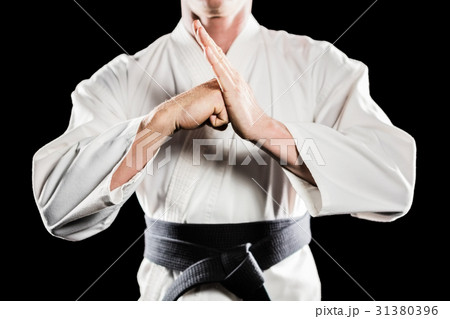 Fighter performing hand salute 31380396