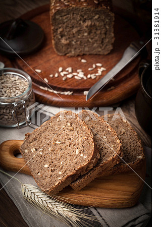 Wholemeal bread with sunflower seeds. Wholemeal bread with sunflower seeds. 31381914