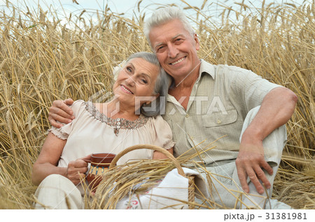 Senior couple on field of wheat Senior couple on field of wheat 31381981