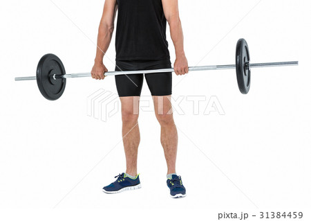 Bodybuilder lifting heavy barbell weights 31384459