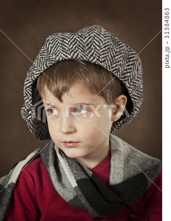 Portrait of a little boy in a hat 31384863