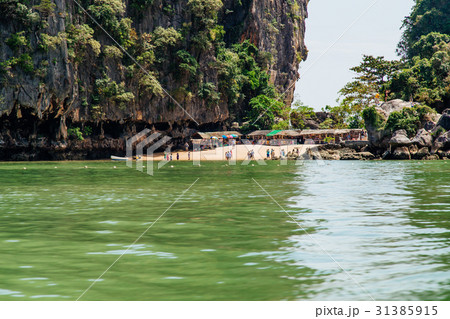 People on the island in Phang Nga Bay, Thailand People on the island in Phang Nga Bay, Thailand 31385915
