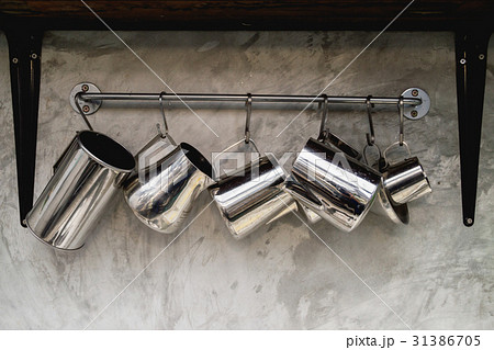 Stainless steel pots  isolated hang on  background 31386705