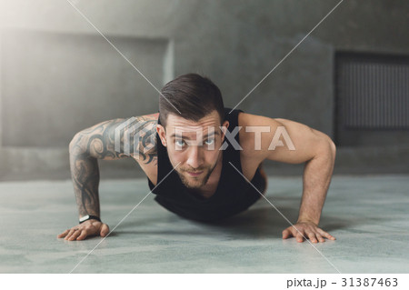 Young man fitness workout, push ups 31387463
