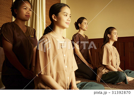 A photo of Two female customers and two spa therapist at spa 31392870