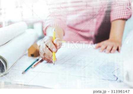 Architect or engineer working in office Architect or engineer working in office 31396147