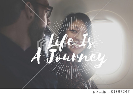 A couple is on honeymoon travel. 31397247