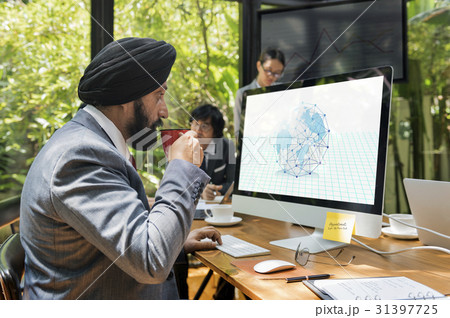 Man working on computer network graphic overlay 31397725