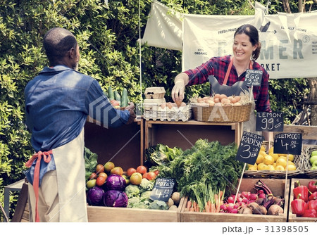 Greengrocer preparing organic fresh agricultural product at farm 31398505