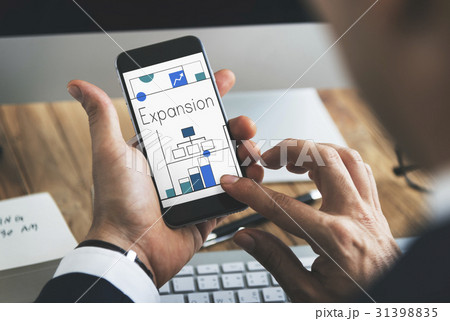 Man working on digital device network graphic overlay Man working on digital device network graphic overlay 31398835