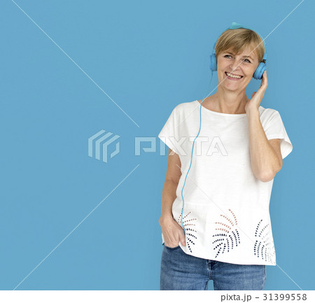 Senior Adult Woman Smiling Happiness Headphones Music Entertainment Senior Adult Woman Smiling Happiness Headphones Music Entertainment 31399558