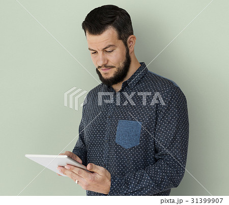 Adult Caucasian Man Using Digital Tablet 31399907