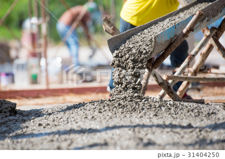 Concrete pouring during commercial concreting Concrete pouring during commercial concreting 31404250
