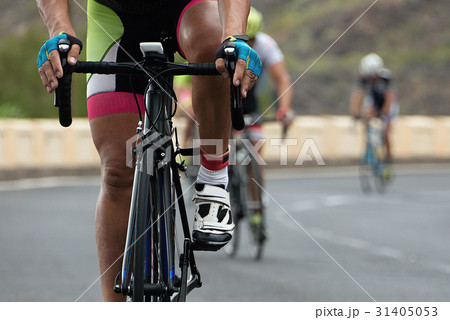 Cycling competition,cyclist athletes riding a race 31405053