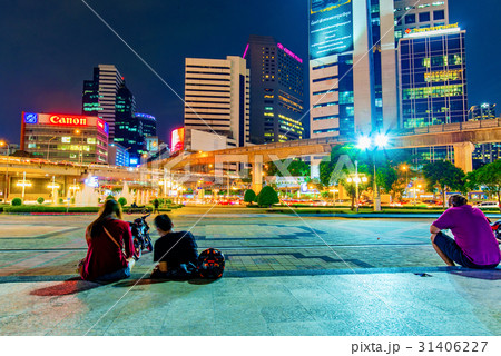 Night view of Silom financial district with people Night view of Silom financial district with people 31406227