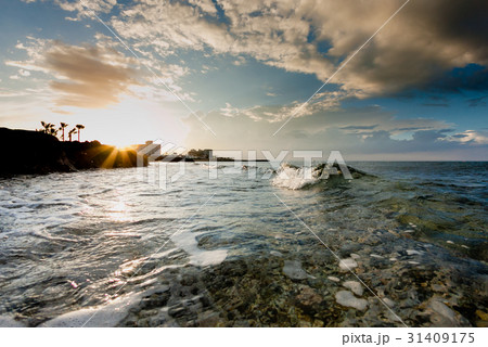 Sunset and sea waves in the Mediterranean Sea 31409175