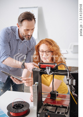 Pleasant professional designers working on a new Pleasant professional designers working on a new 31410948